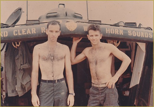Larry and Joe McNeil in front of an Amtrac